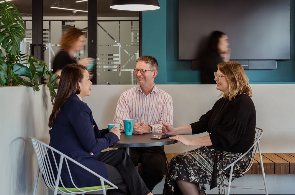 Staff meeting over coffee