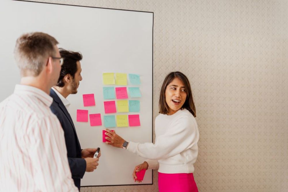 Colleagues at whiteboard