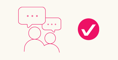 A pink speech bubble featuring a white check mark inside